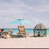 Baby-in-playard-facing-ocean