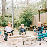 Kids-around-fire-in-venture-chairs